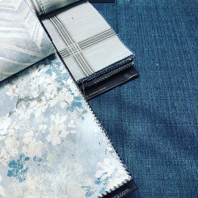 sofa, pillows and drapery all combine to create a 