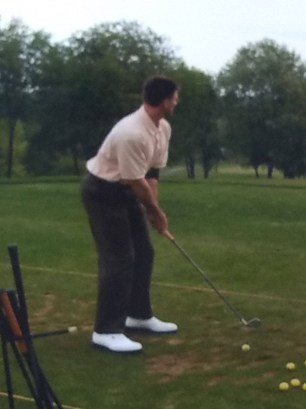 Warming up on the range at Deer Ridge GC in Bellev