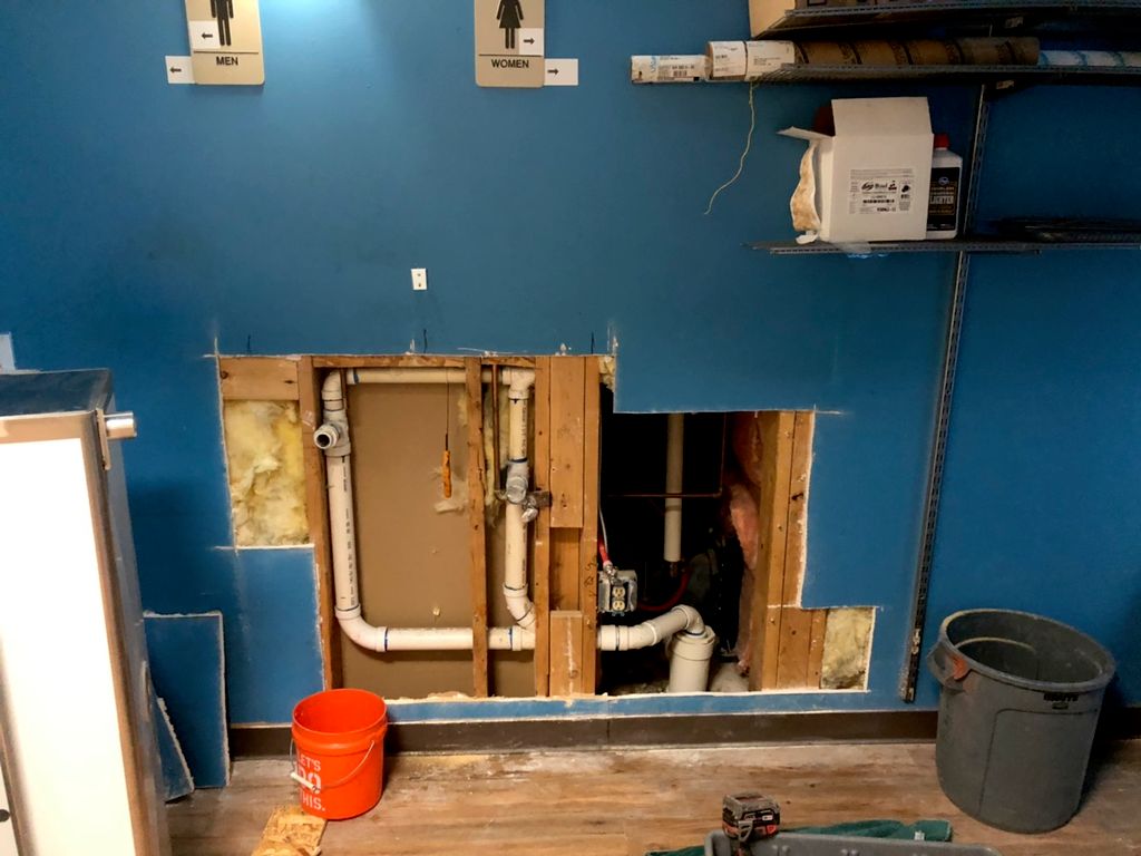 Side by side drinking fountains removed, wall open