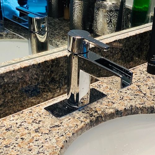 Bathroom sink faucet installation.