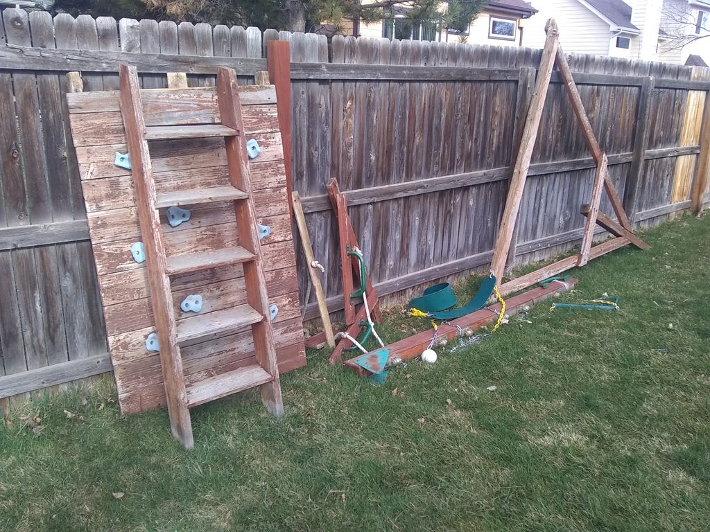 Used playground equipment before assembly no manua
