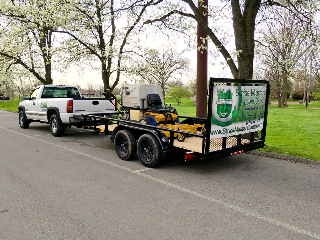 Stripe Masters Lawn Care rig. Honk when you see us