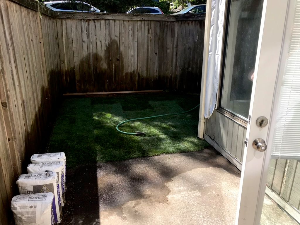 After: removed trees then sod installation 