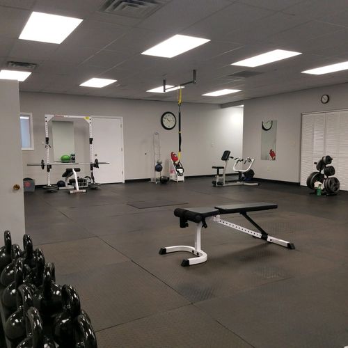Changing/mud room, main gym, cardio room and two p