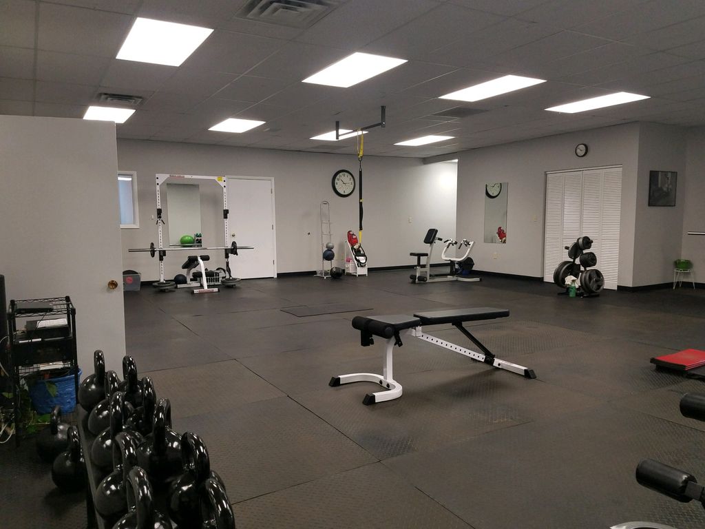 Changing/mud room, main gym, cardio room and two p