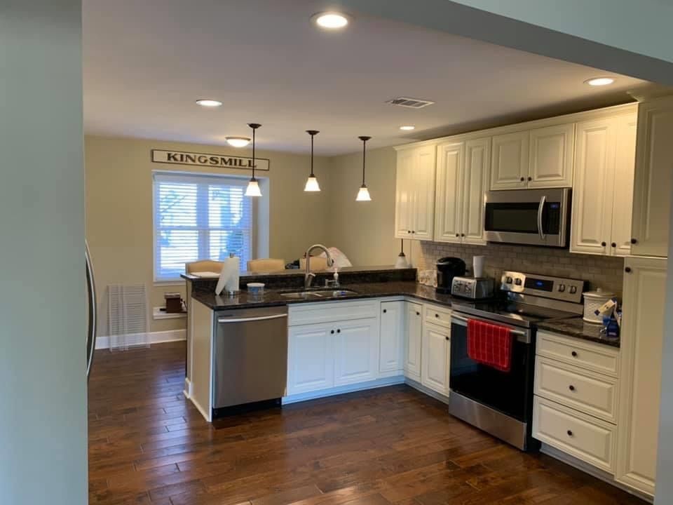 New pendant lights add some charm to this kitchen 