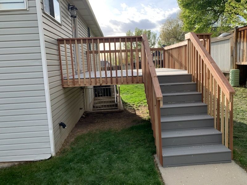deck build with trex and pro wood hand rail.