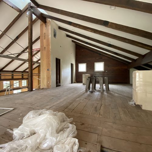 Vaulted ceilings with 130 year old reclaimed floor