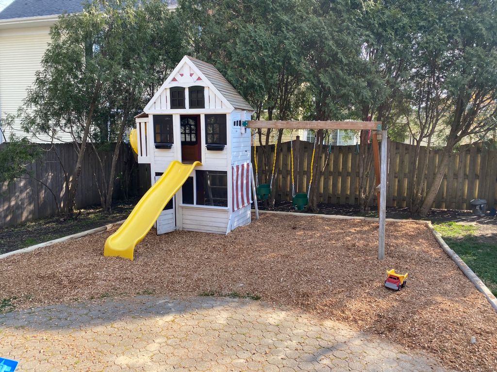 Sam installed a play set in our backyard and made 