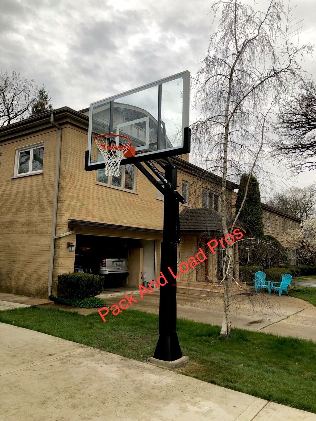 Basketball hoop in ground installation in River Fo