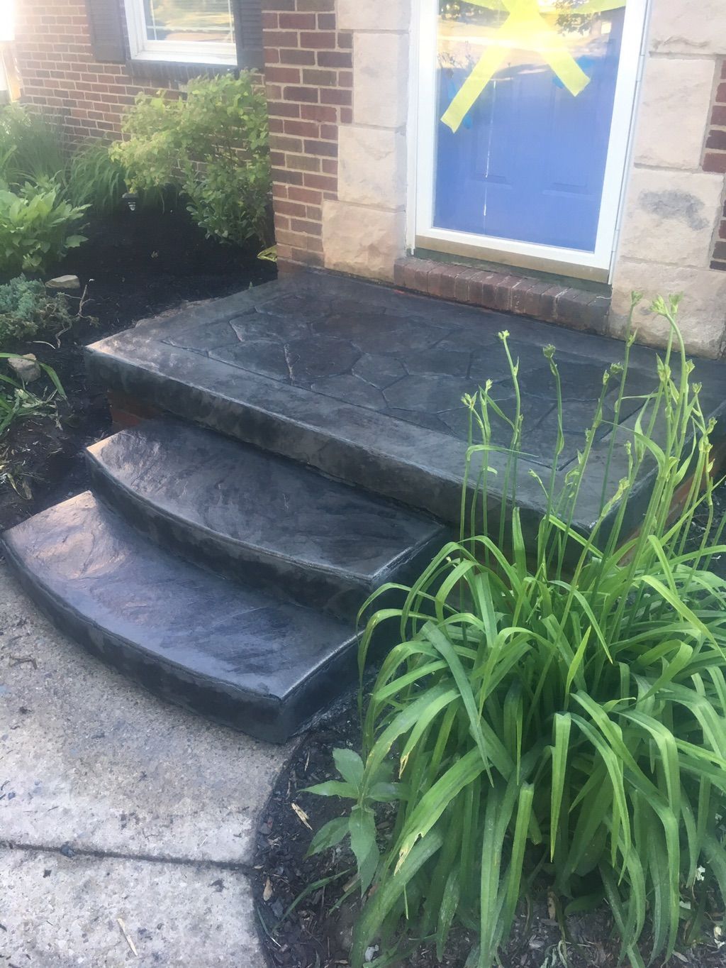 Front stoop replacement. New brick set. And new st