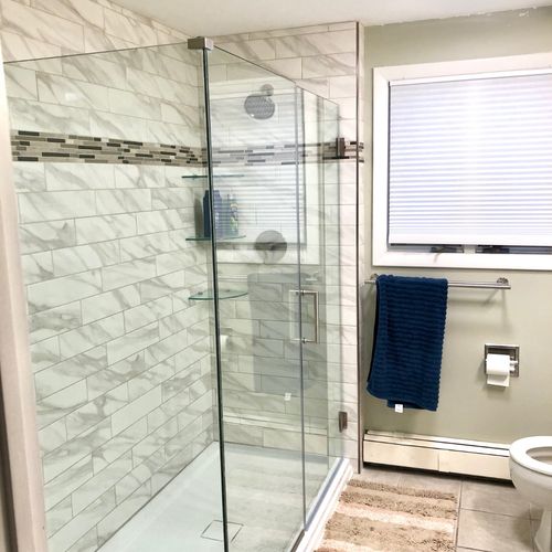 We hired All In One Renovations to tile our shower