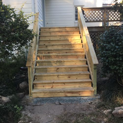 New, wider stairs for this old deck.