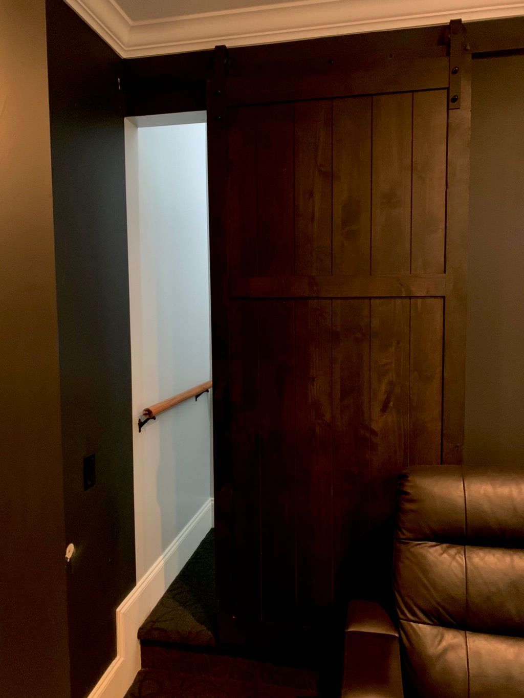 Holmes installed a Barn Door in my TV room.  The B