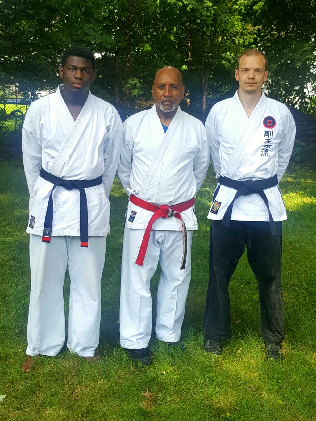 Sensei Chris with his instructor and fellow black 