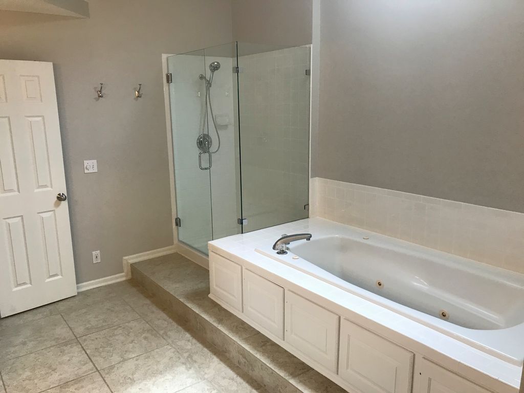 Painted Bathroom, replaced fixtures, repaired tile
