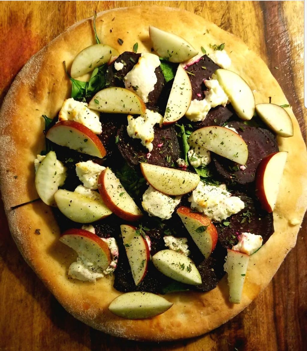 Roasted beet Pizza, chevre, local apples & arugula