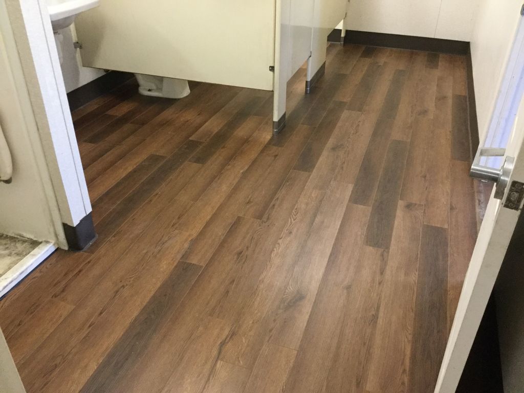 Install luxury vinyl plank floor in commercial spa