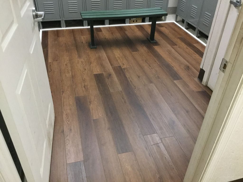 Install luxury vinyl plank floor in commercial spa