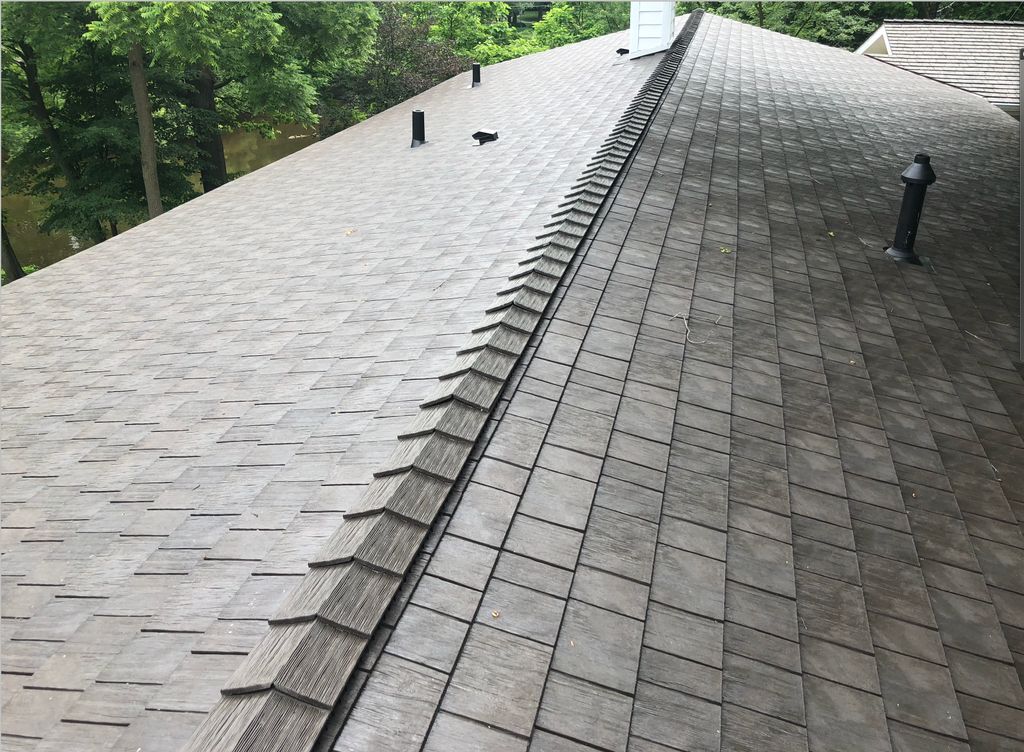 Rubber shingles made from recycled tires will last