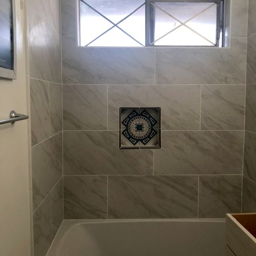 I Love the look of my the new shower tile and floo