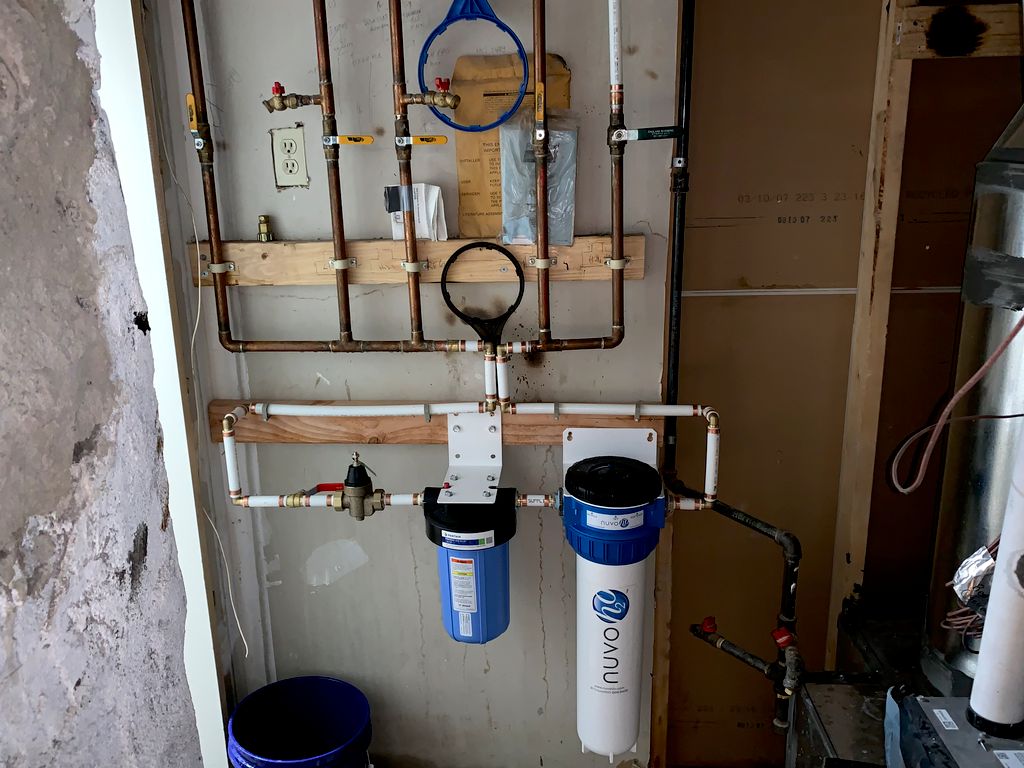 Nuvo water treatment and sediment filter installat