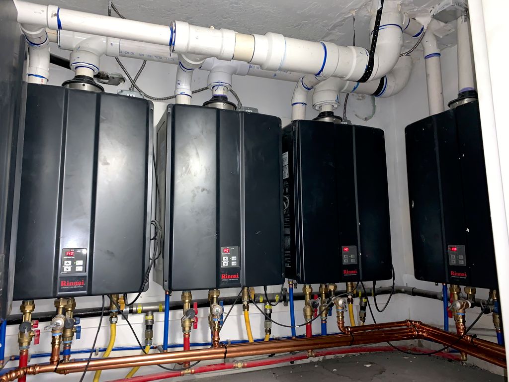 Tankless water heaters to service a 24 unit apartm