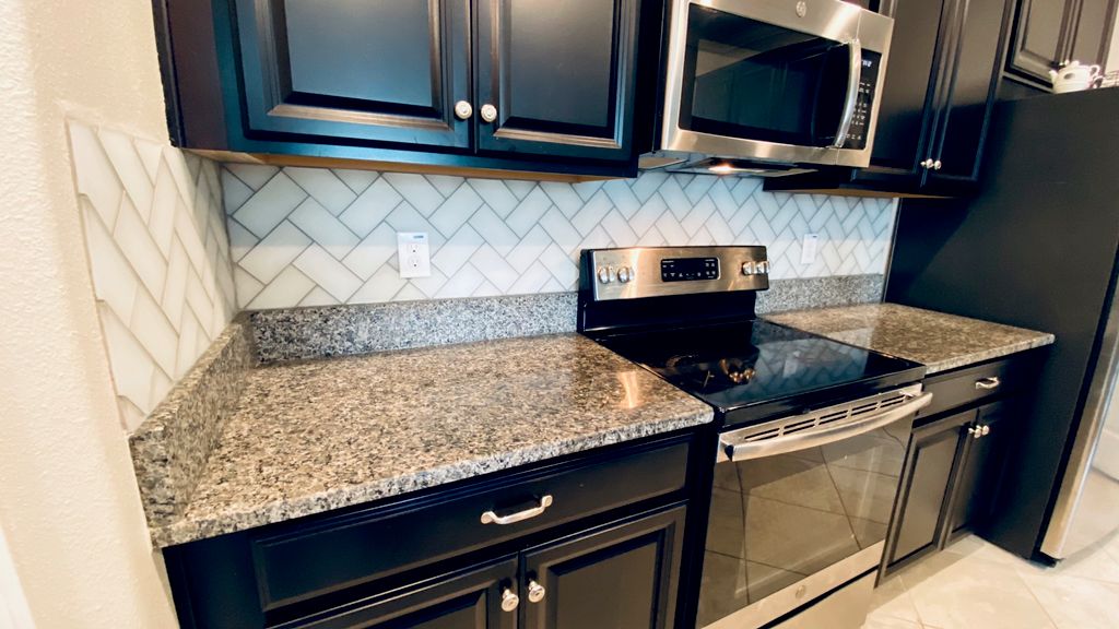 herringbone pattern glass tile, backsplash 