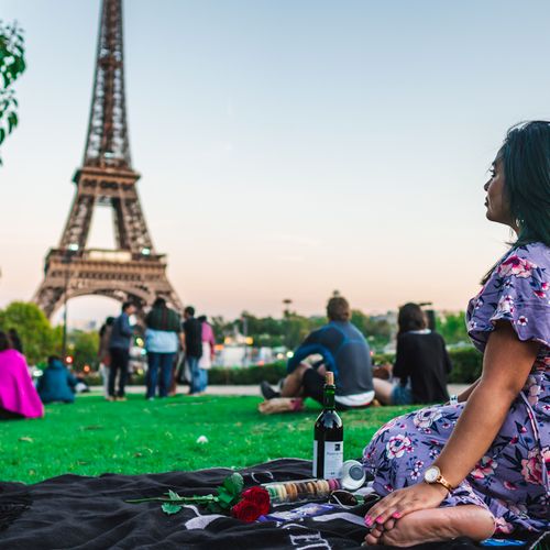 Sitting near the Eiffel Tower