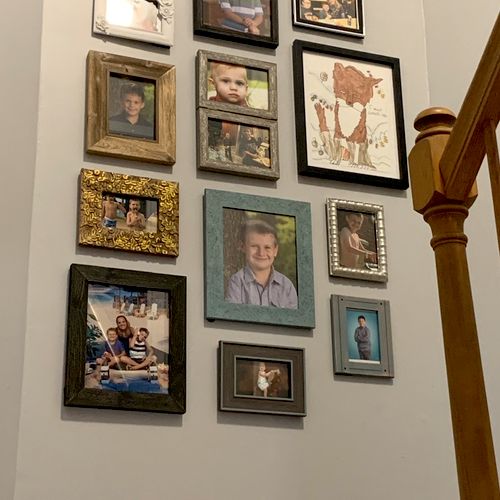 Jason did a perfect job hanging our family photos,