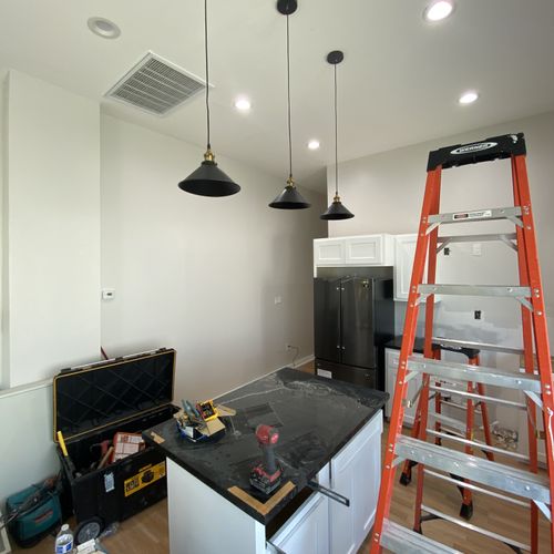 Installation of 3 light fixtures above kitchen isl