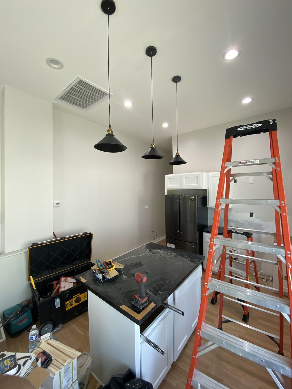 Installation of 3 light fixtures above kitchen isl