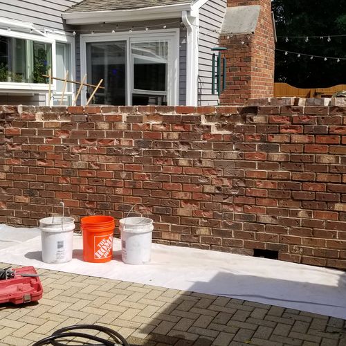 Repairs were done on a 40+ yr brick privacy wall. 