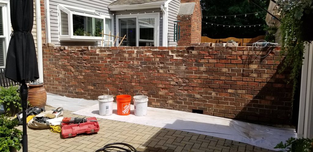 Repairs were done on a 40+ yr brick privacy wall. 