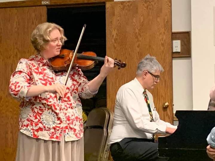 Susan playing at family Christmas event