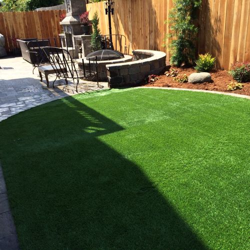 Synthetic lawn with paver edging 
