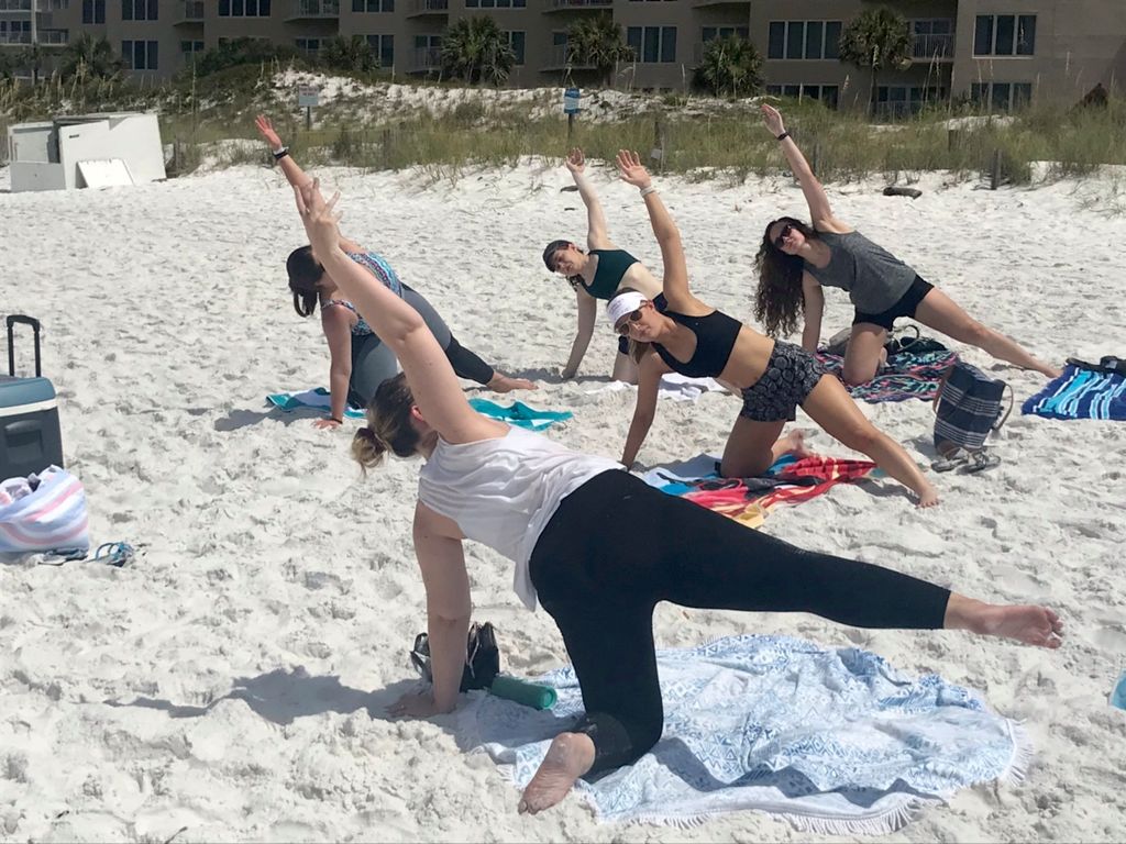 Mallory lead a group yoga session for my bachelore