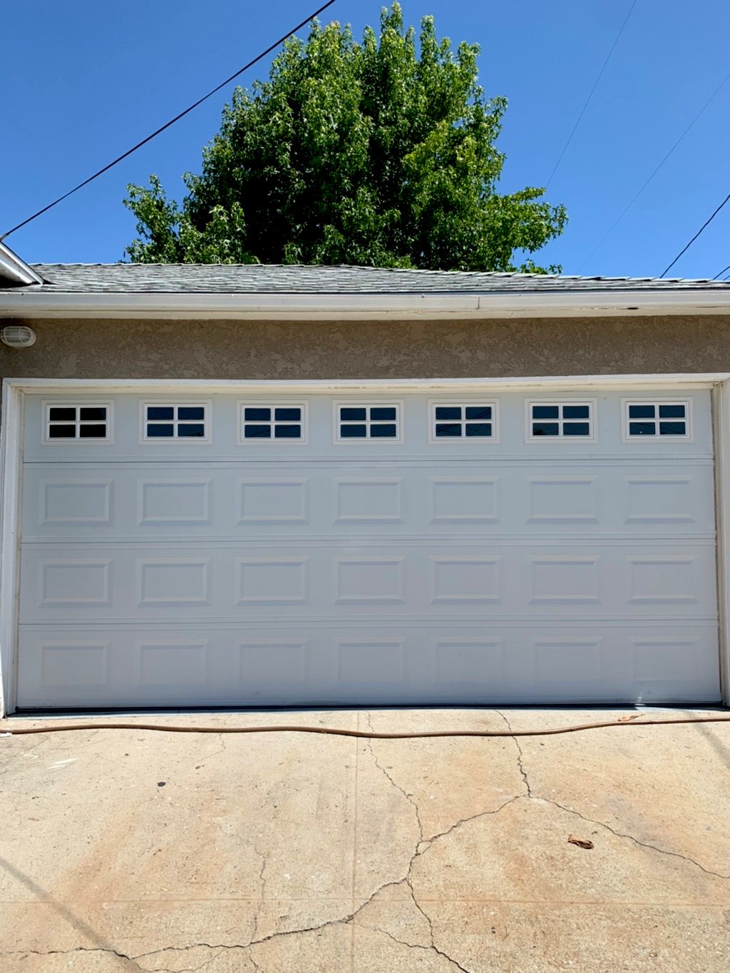 Aby and his partner repaired my garage door, inclu