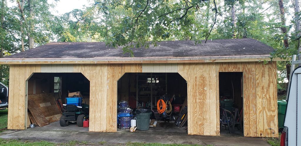 shop progress with new siding
