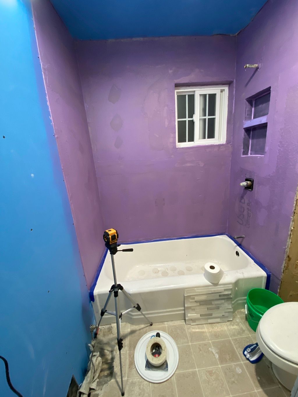 Waterproofing a shower getting ready to laser leve