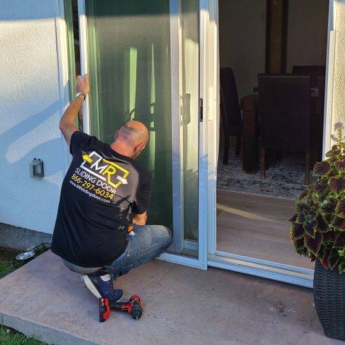 MR Sliding Door repair Technicians adjusting rolle