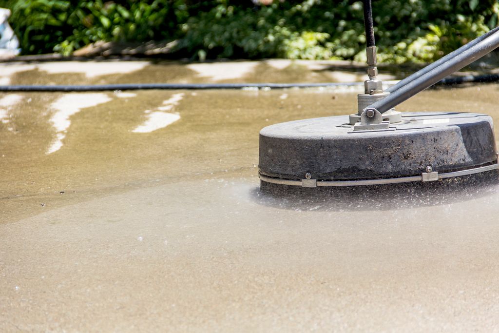 flat surface cleaning a driveway