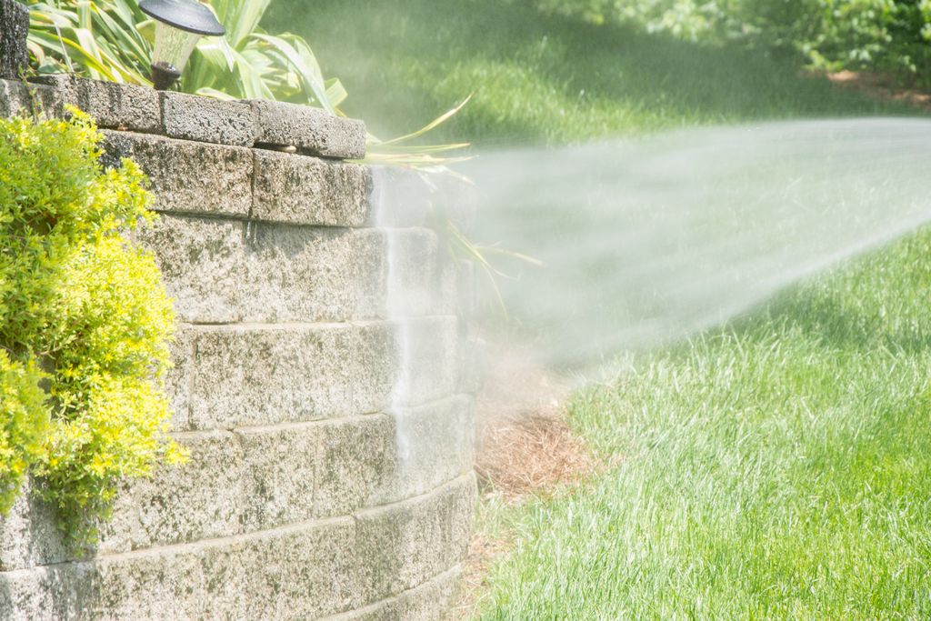 pressure washing a retaining wall