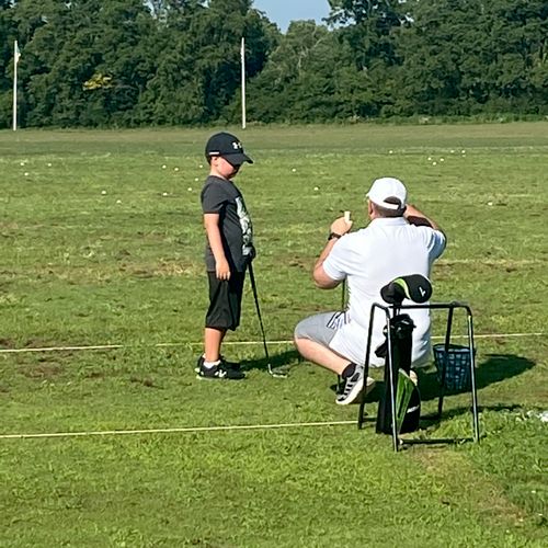 Robert gave my son (8) his first golf lesson today