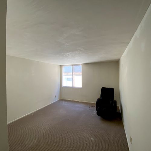 Popcorn ceiling removal and resurfaced 