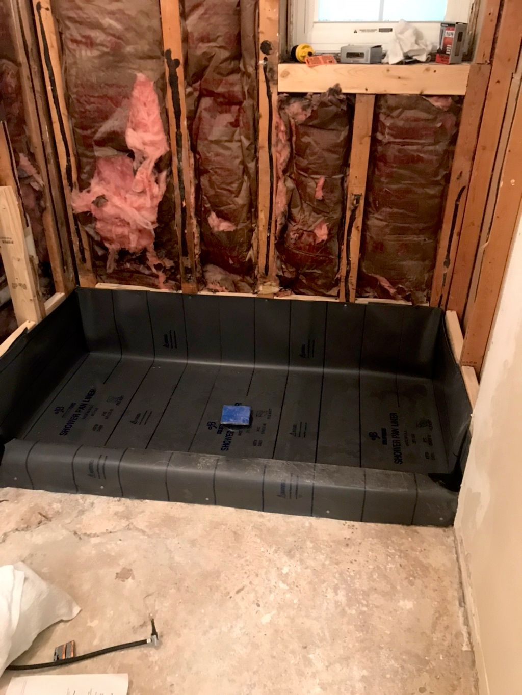 Shower liner installation