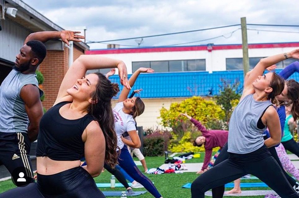 Teaching meditation and yoga at the opening of F45