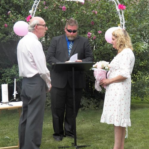 Minister Jim performed a backyard ceremony. What a