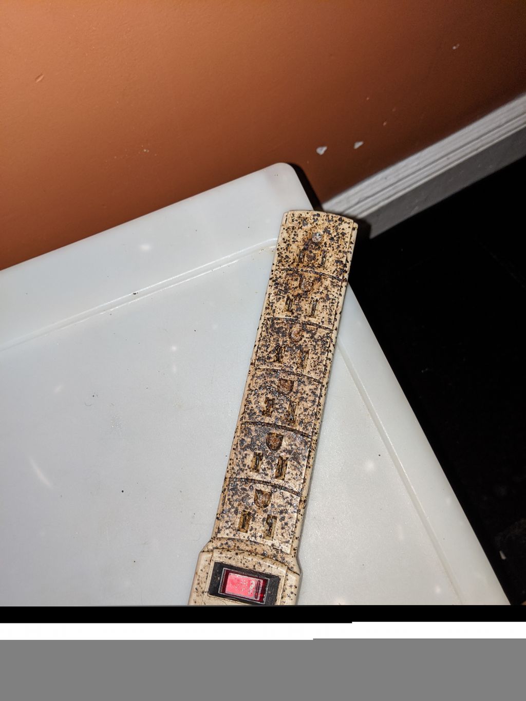 Power strip kept near client's bed, infested with 