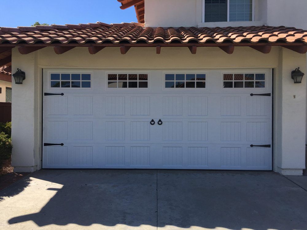 New Carriage House Style Garage Door with window i